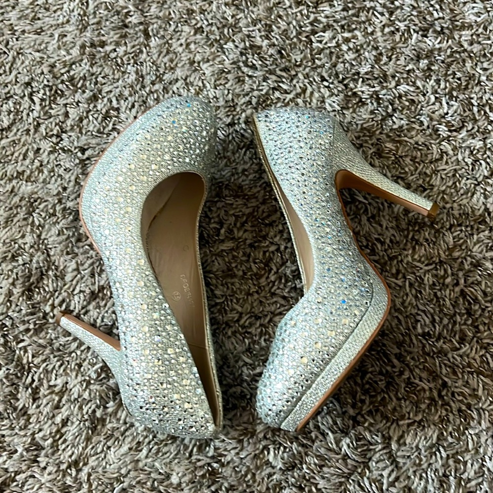 Silver heels. Sized US 7.5.